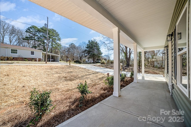 view of patio featuring covered porch