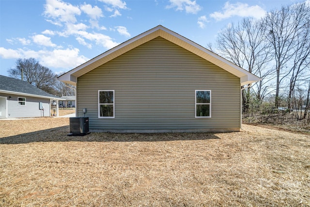 view of home's exterior featuring central AC unit