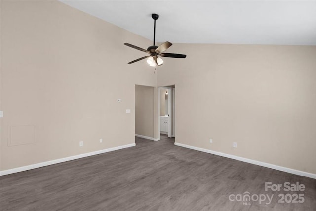 empty room featuring high vaulted ceiling, dark wood-style floors, baseboards, and a ceiling fan