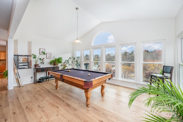 playroom with light wood finished floors, billiards, and high vaulted ceiling