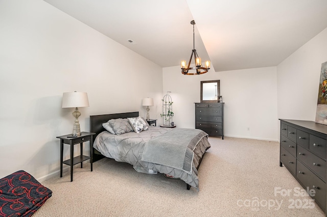 bedroom with light colored carpet, visible vents, an inviting chandelier, vaulted ceiling, and baseboards