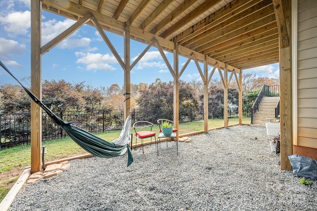 exterior space with a patio, stairway, and a fenced backyard