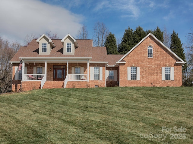 cape cod house featuring a porch, crawl space, brick siding, and a front lawn