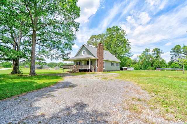 3640 Oak Haven Ln, Shelby, NC 28150 - view of front facade featuring a porch, a chimney, and a front lawn
