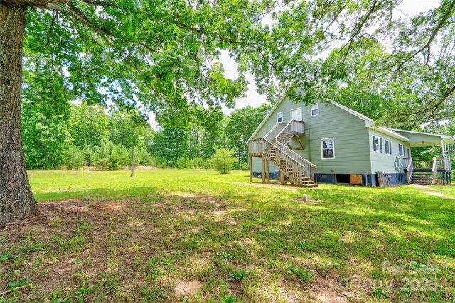 3640 Oak Haven Ln, Shelby, NC 28150 - view of green lawn featuring stairs and a wooden deck