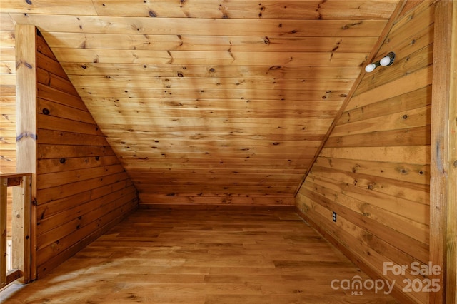3640 Oak Haven Ln, Shelby, NC 28150 - additional living space with wooden walls, vaulted ceiling, light wood-type flooring, a relaxing sauna, and wooden ceiling
