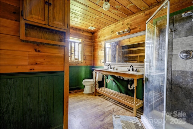 3640 Oak Haven Ln, Shelby, NC 28150 - bathroom with a shower stall, wood finished floors, wood ceiling, double vanity, and wooden walls