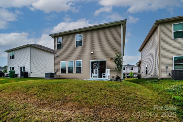 2131 Belterra Dr, Charlotte, NC 28216 - back of property featuring central air condition unit and a yard