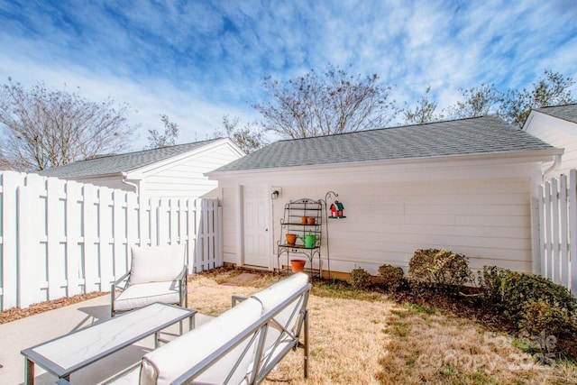 view of outdoor structure with fence