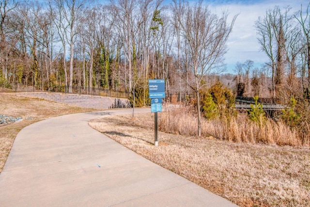 surrounding community featuring fence