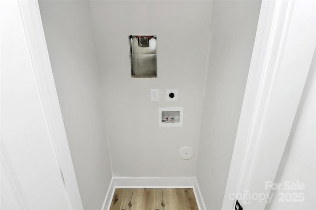 laundry room with baseboards, light wood finished floors, laundry area, electric dryer hookup, and washer hookup