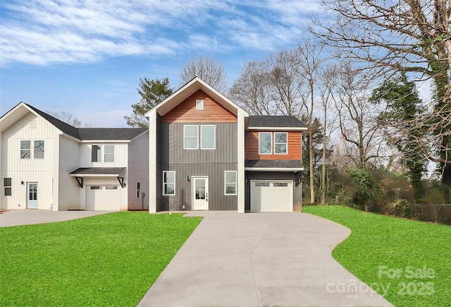 view of front of property with a front yard, an attached garage, driveway, and a shingled roof