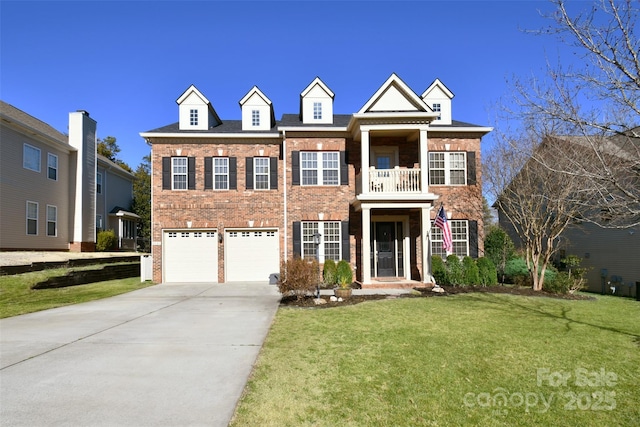 view of front of house with brick siding, concrete driveway, a balcony, an attached garage, and a front yard