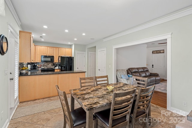 dining space with ornamental molding, recessed lighting, baseboards, and light tile patterned floors