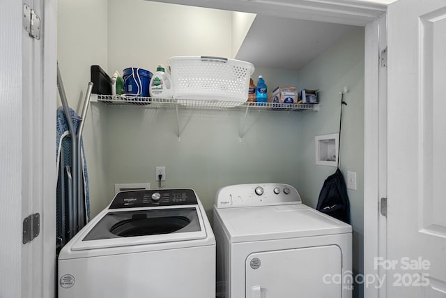 laundry area with laundry area and independent washer and dryer