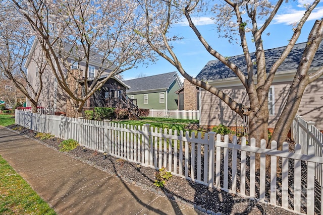 exterior space featuring a fenced front yard