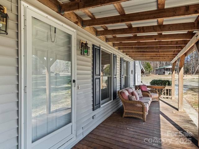 wooden terrace featuring a porch