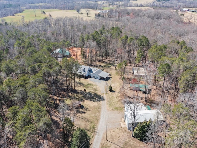 bird's eye view with a forest view