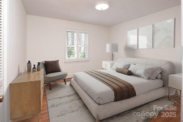 bedroom featuring light wood finished floors