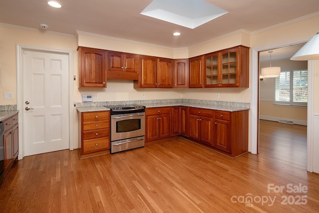 kitchen featuring stainless steel range with electric stovetop, light wood-style flooring, and brown cabinets