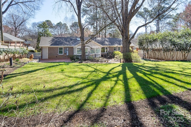 view of yard with a patio area and fence