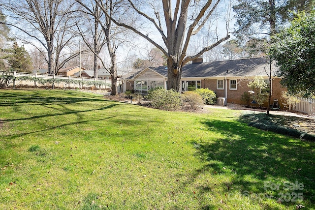 view of yard with fence