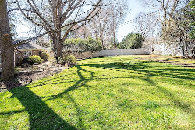 view of yard featuring fence