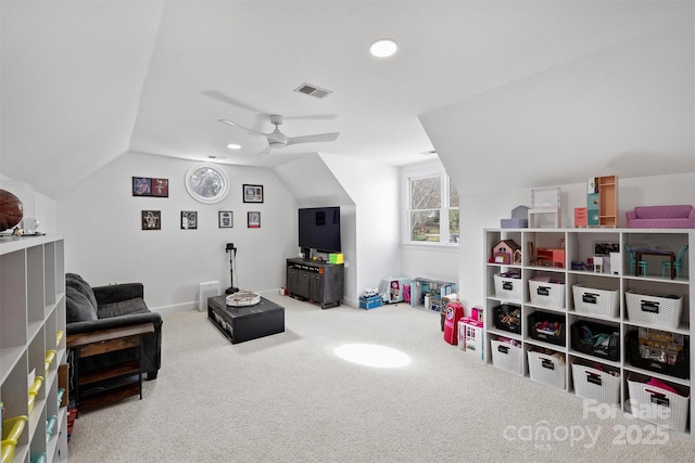 game room featuring visible vents, carpet flooring, vaulted ceiling, ceiling fan, and baseboards