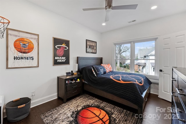 bedroom featuring dark wood-style flooring, recessed lighting, visible vents, and baseboards