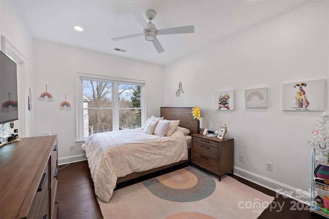 bedroom with baseboards, visible vents, dark wood finished floors, a ceiling fan, and recessed lighting