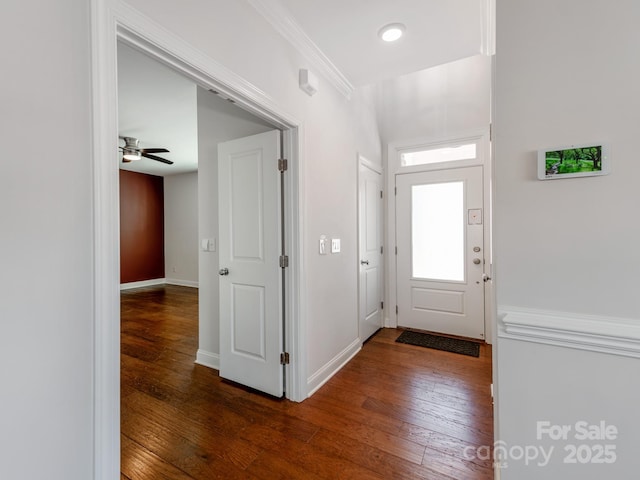 foyer featuring ceiling fan, recessed lighting, baseboards, wood-type flooring, and crown molding