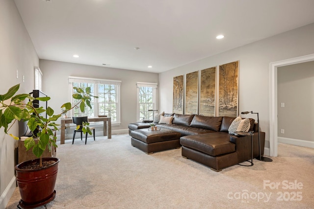 living room with carpet flooring, recessed lighting, and baseboards