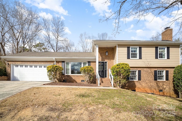 tri-level home featuring concrete driveway, brick siding, crawl space, and a chimney