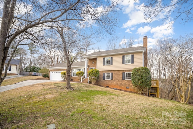 tri-level home featuring a garage, brick siding, driveway, crawl space, and a chimney