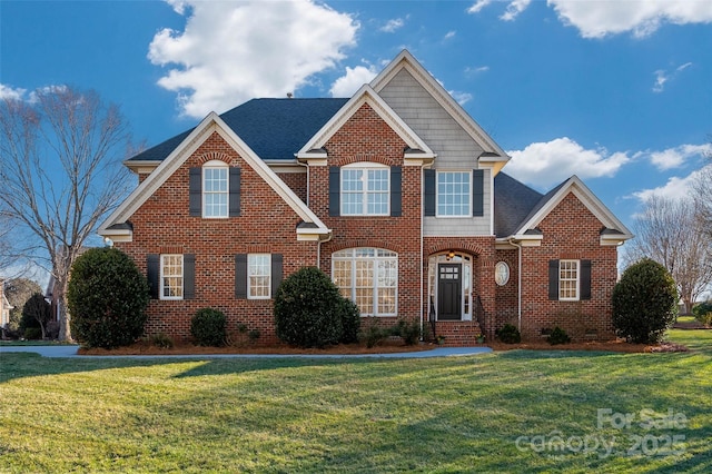 traditional-style house featuring a shingled roof, a front yard, brick siding, and crawl space