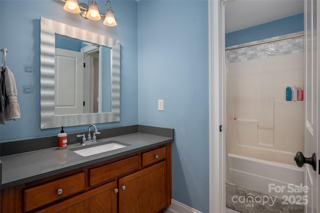 bathroom with a chandelier, vanity, and shower / bath combination with curtain