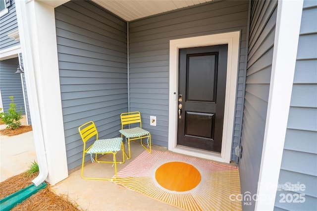 doorway to property with a porch