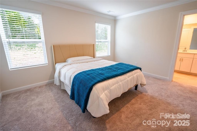 bedroom featuring light carpet, baseboards, multiple windows, and ornamental molding