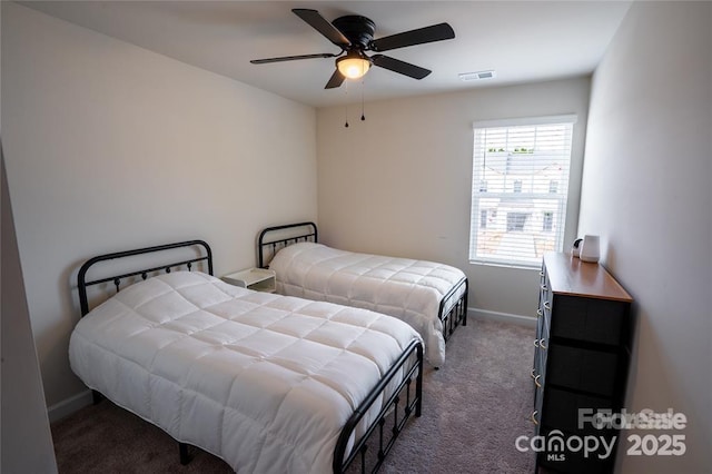 bedroom with carpet flooring, ceiling fan, visible vents, and baseboards