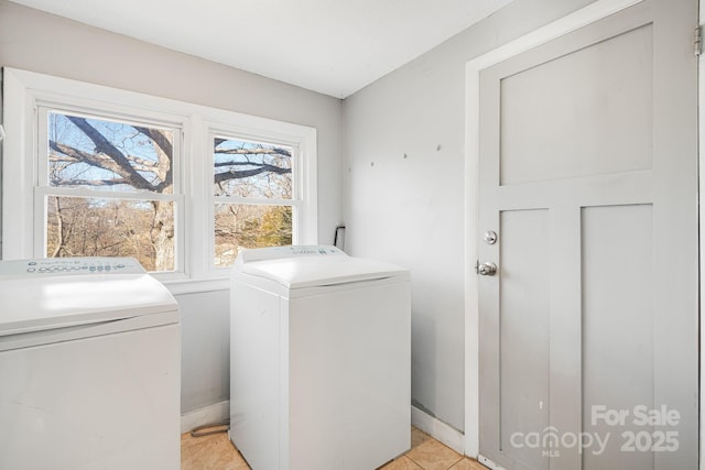 laundry room featuring laundry area and separate washer and dryer