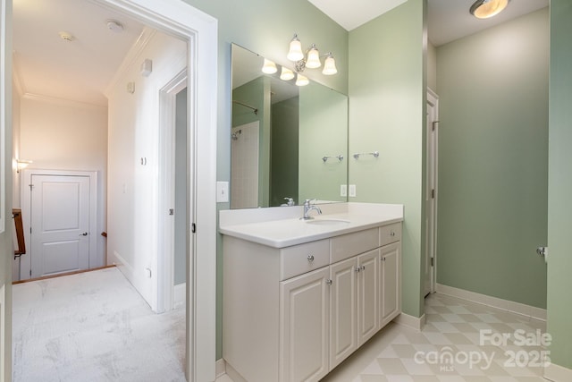 full bathroom with a shower, vanity, and baseboards