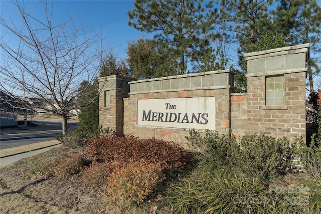 view of community sign