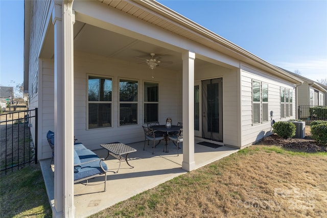 back of property featuring a patio area, fence, and ceiling fan