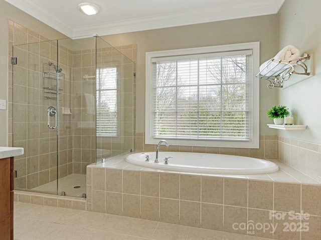 bathroom featuring a stall shower, vanity, a bath, and crown molding