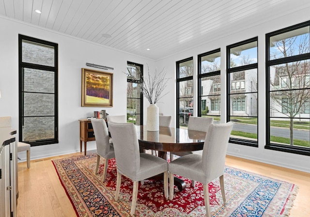 dining area featuring crown molding, wood ceiling, recessed lighting, and light wood-style floors