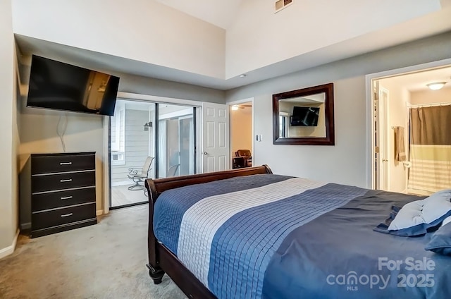 bedroom featuring visible vents, light colored carpet, a closet, and baseboards