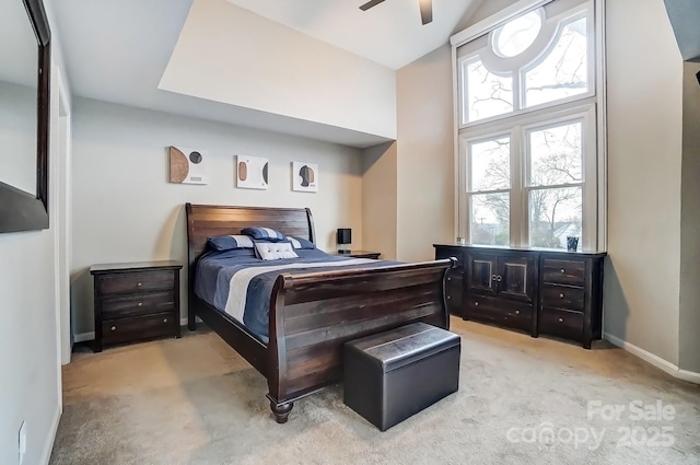 carpeted bedroom with baseboards and ceiling fan