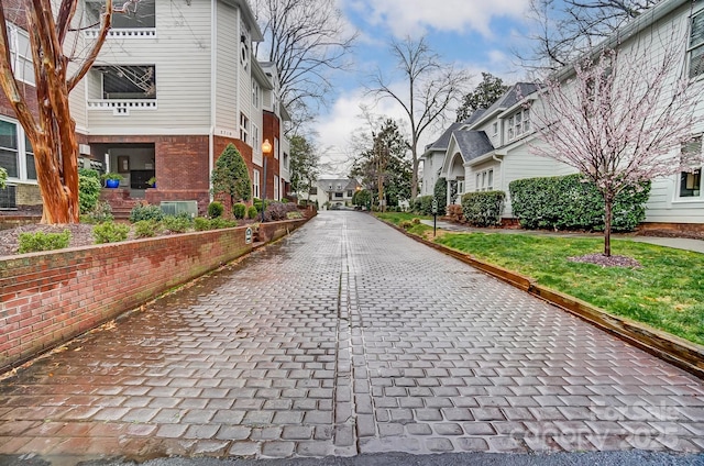 view of road with a residential view