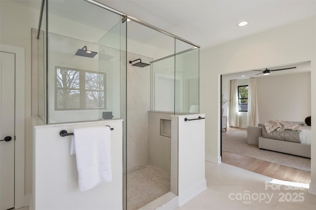 full bathroom featuring recessed lighting, walk in shower, wood finished floors, and ensuite bathroom