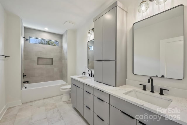 full bathroom with bathtub / shower combination, a sink, toilet, and double vanity